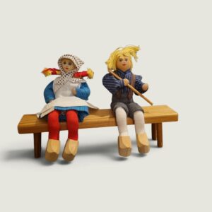 Charlotte Weibull Traditional Folk Dolls Sitting On A Bench
